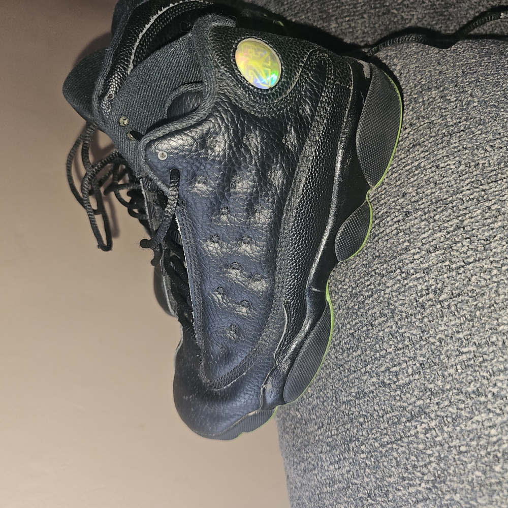 Black Sneakers with Green Accents